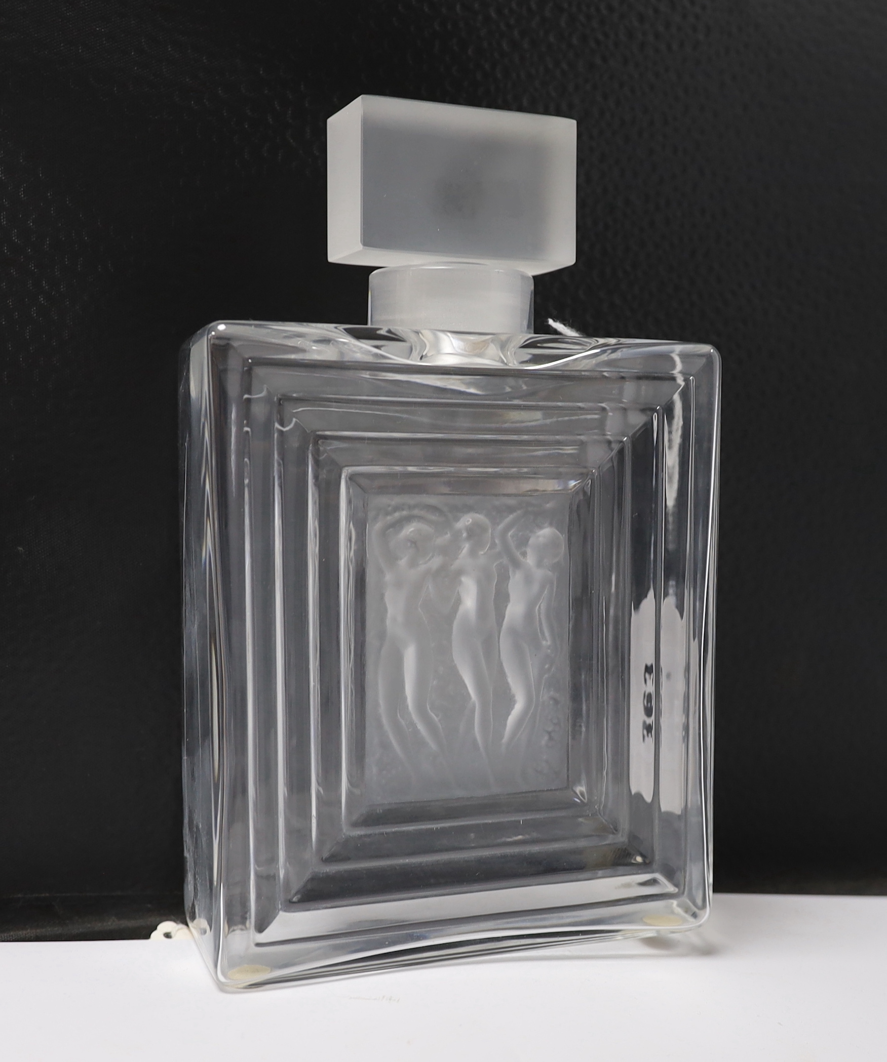 Two Lalique Duncan pattern glass scent bottles and stoppers and a matching toilet box and cover, tallest 20cm